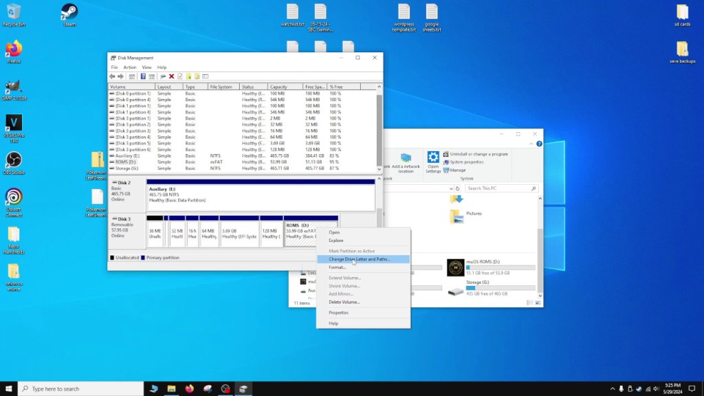 You may need to assign a drive letter to the ROMs partition using Disk Management before it shows up in Windows.