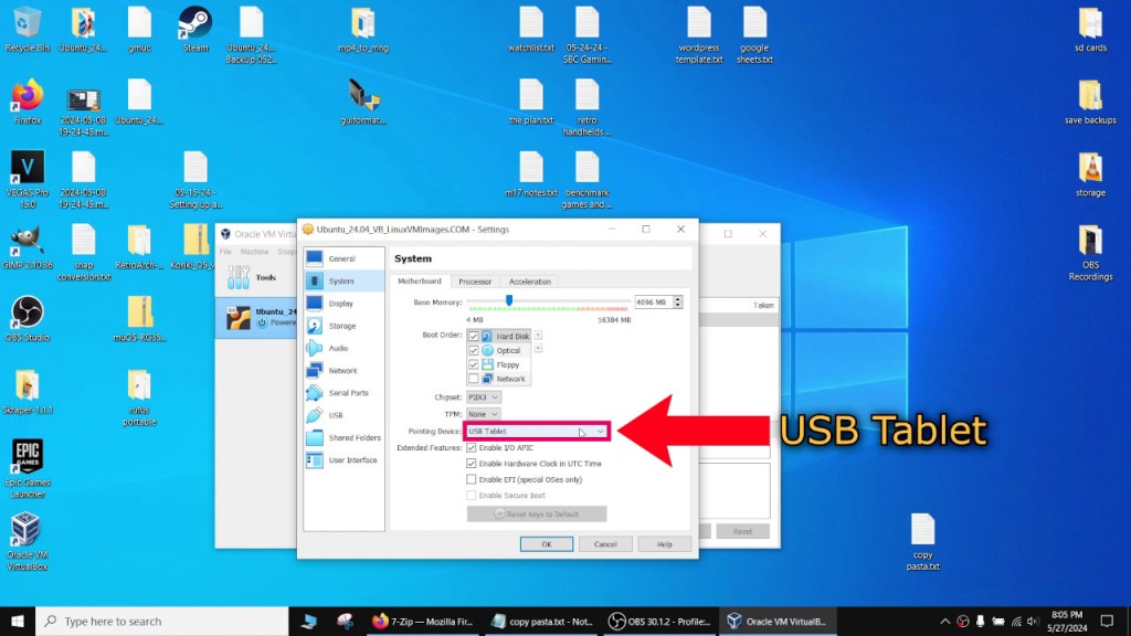 Make sure "Pointing Device" is set to "USB Tablet" for your mouse to work when in the virtual machine.